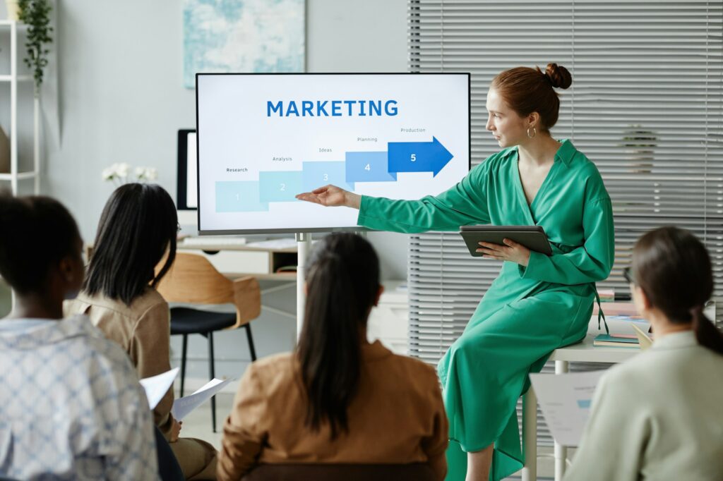 Businesswoman giving new info about marketing at training